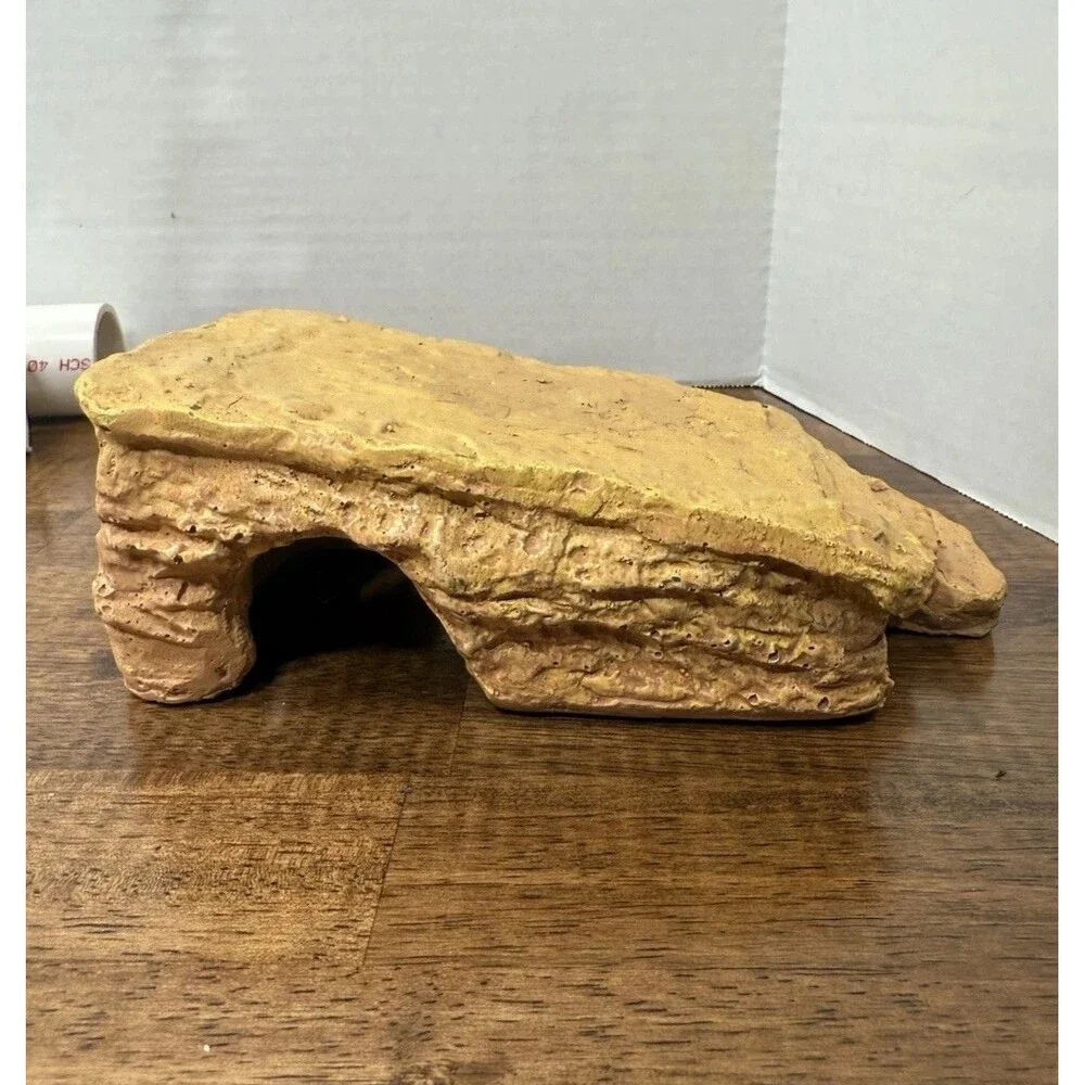 miscellaneous  Reptile supplies, One hide, PVC tubing, Food and water bowl ￼